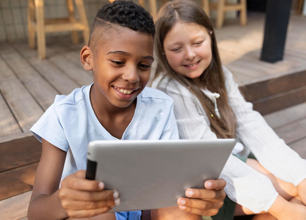 students-looking-at-tablet